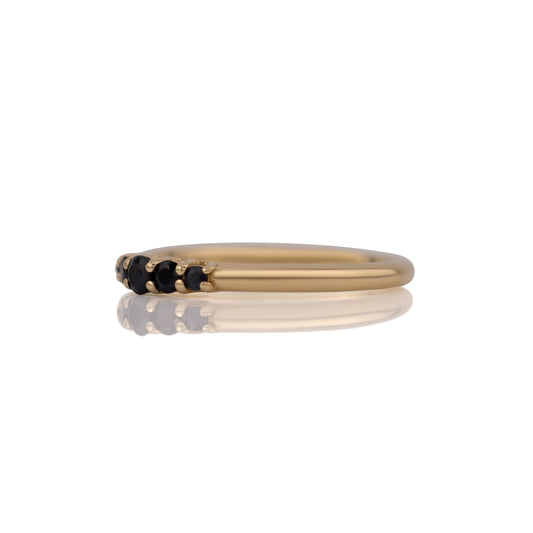Side profile of the sapphire five stone band showing its low profile