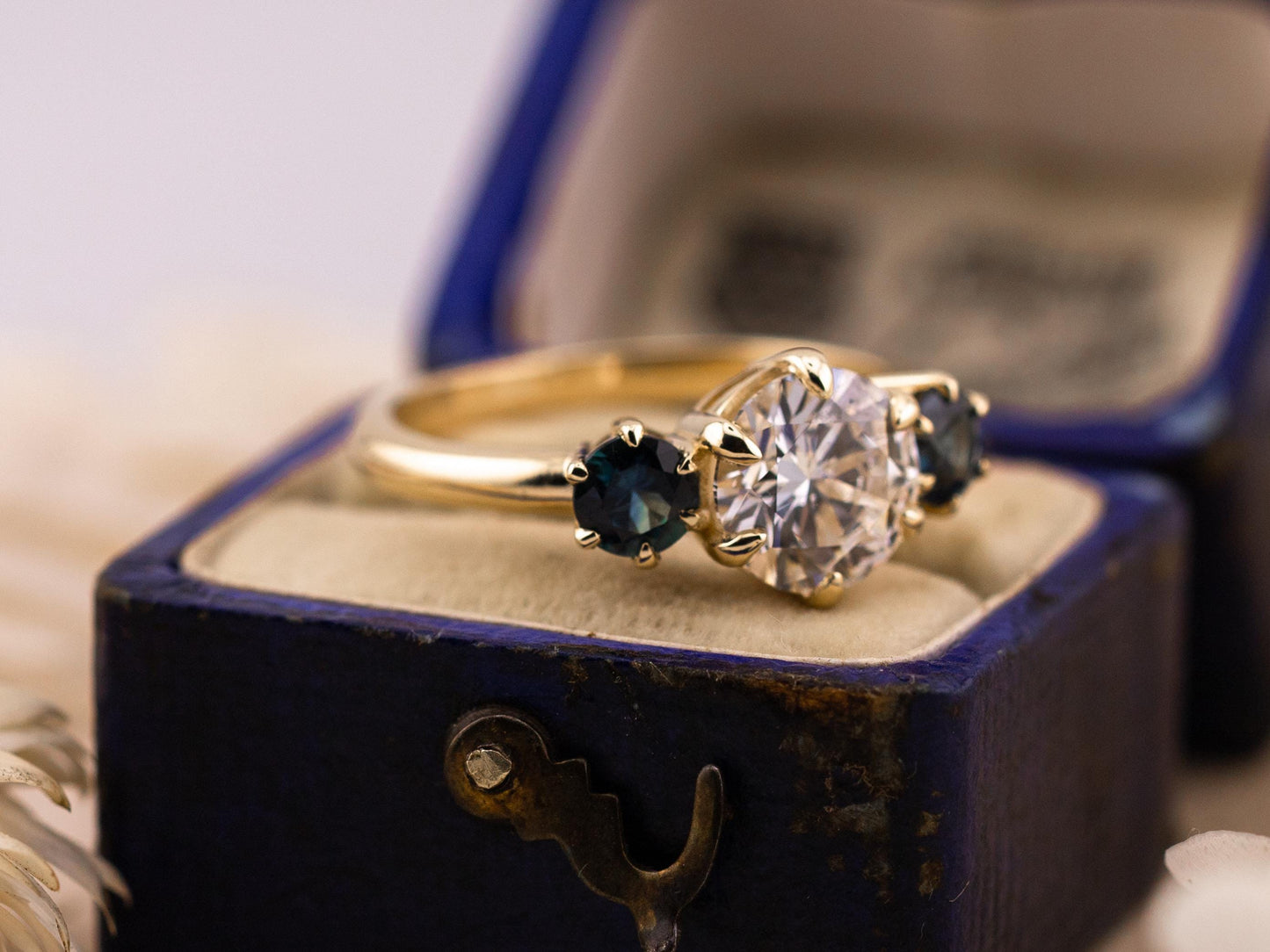 Round cut three stone engagement ring with sapphire side stones lab grown diamond 2 carat 14k solid gold IGI certified lab grown diamond