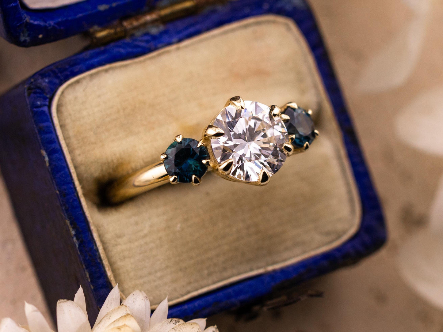 Round cut three stone engagement ring with sapphire side stones lab grown diamond 2 carat 14k solid gold IGI certified lab grown diamond