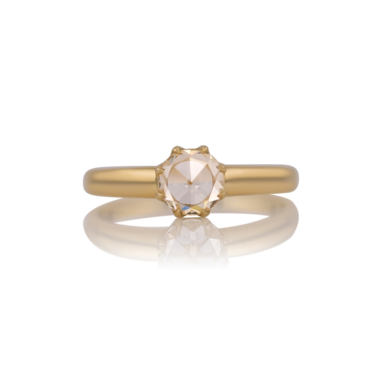 1.01ct rose cut natural diamond solitaire ring in 18k yellow gold, shown head on against a white background