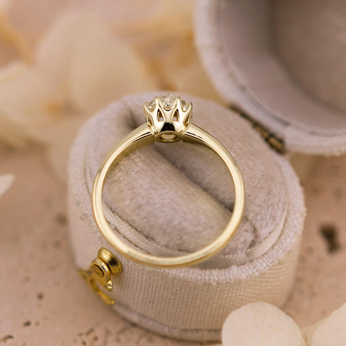 Camille rose cut diamond ring shown from above in warm yellow gold