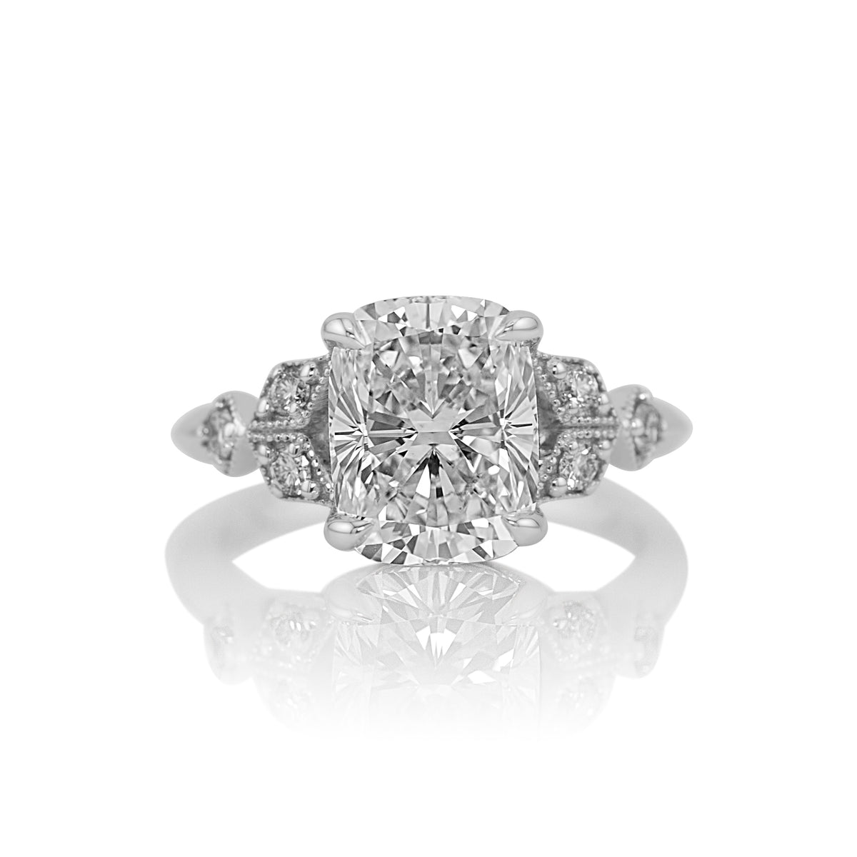 4.05ct cushion cut lab diamond ring in 14k white gold, shown head on against a white background