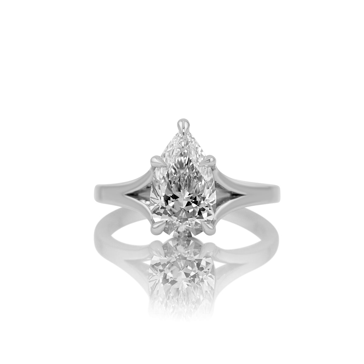 2.42ct pear lab diamond split shank ring in platinum, shown head on against a white background