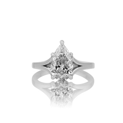 2.42ct pear lab diamond split shank ring in platinum, shown head on against a white background