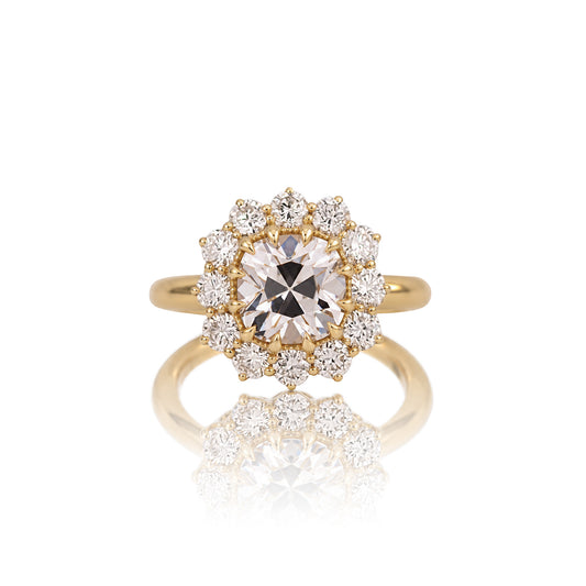 2.64ct old mine cut halo ring in 14k yellow gold, shown head on against a white background