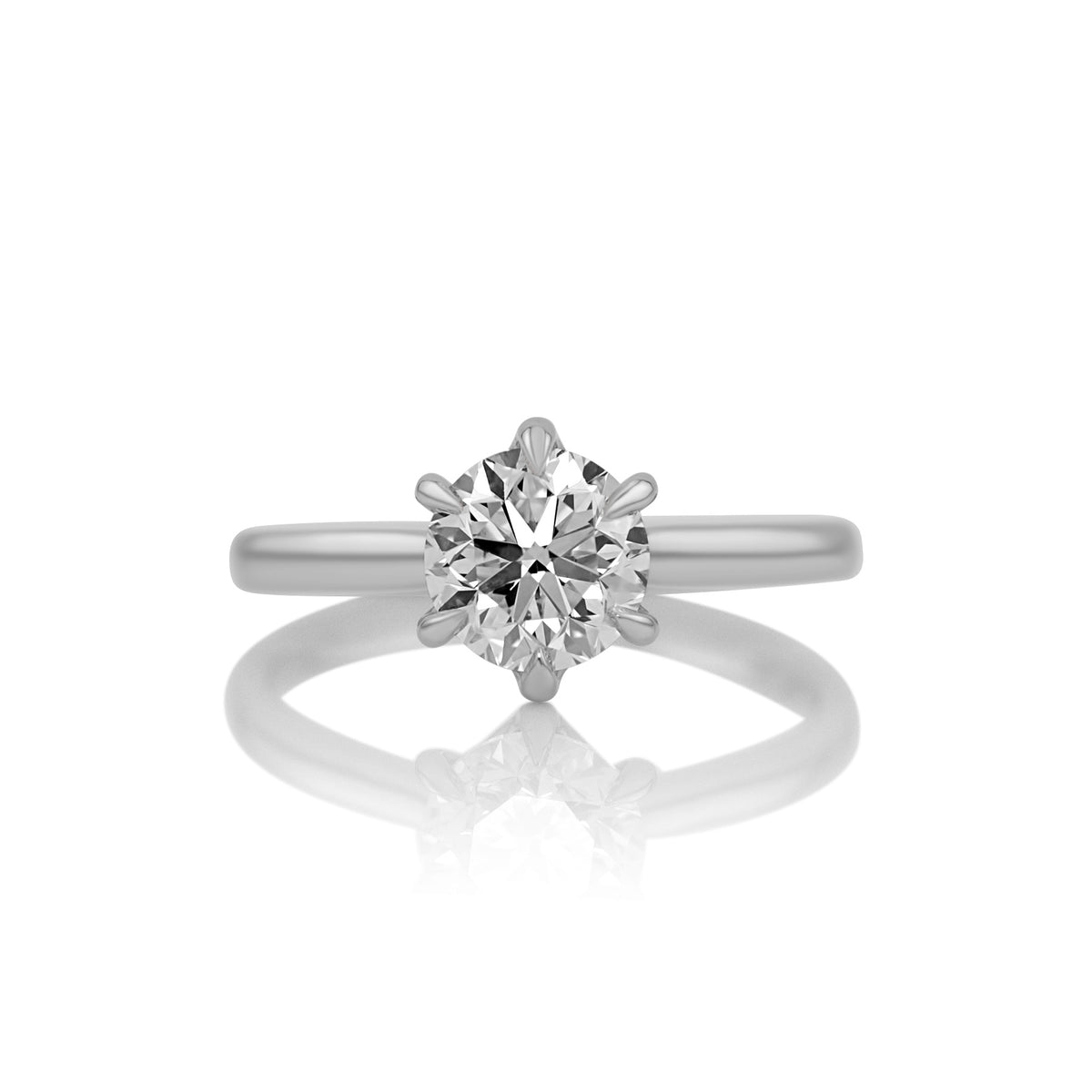 1.50ct round brilliant natural diamond solitaire ring in platinum, shown head on against a white background