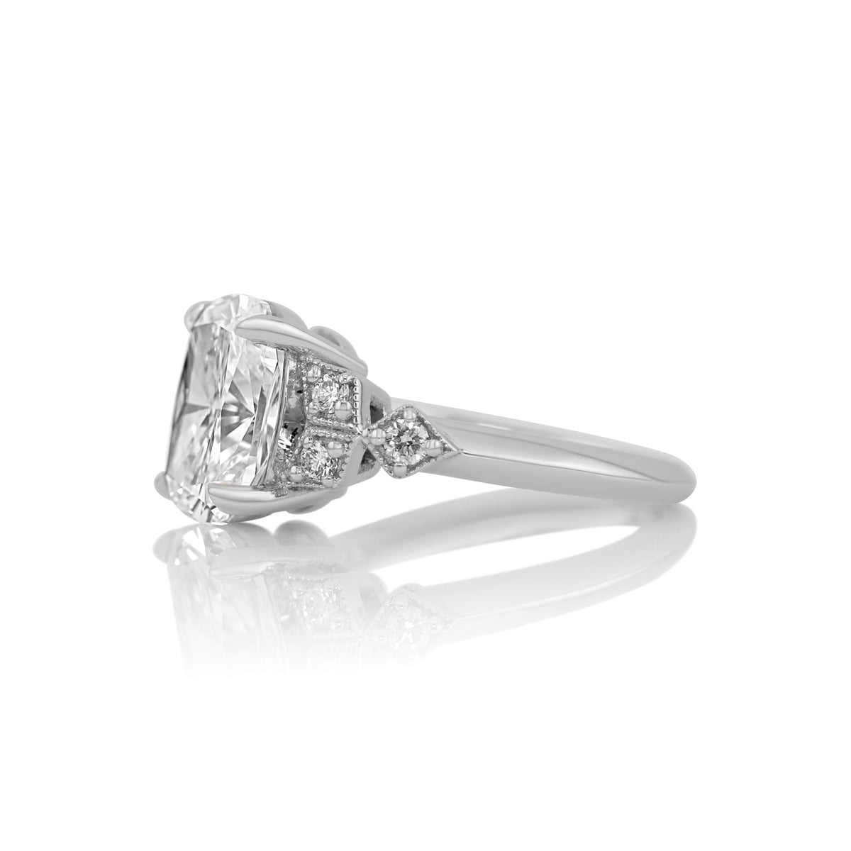 Side profile of the cushion cut ring showing the Art Deco inspired detailing