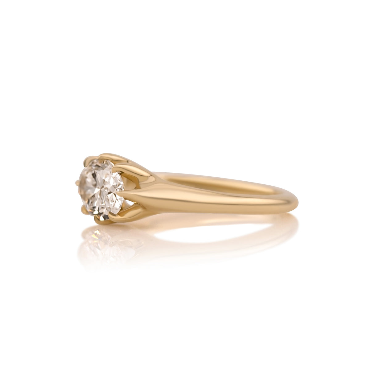 Side profile of the Louise east west ring showing the eight prong setting