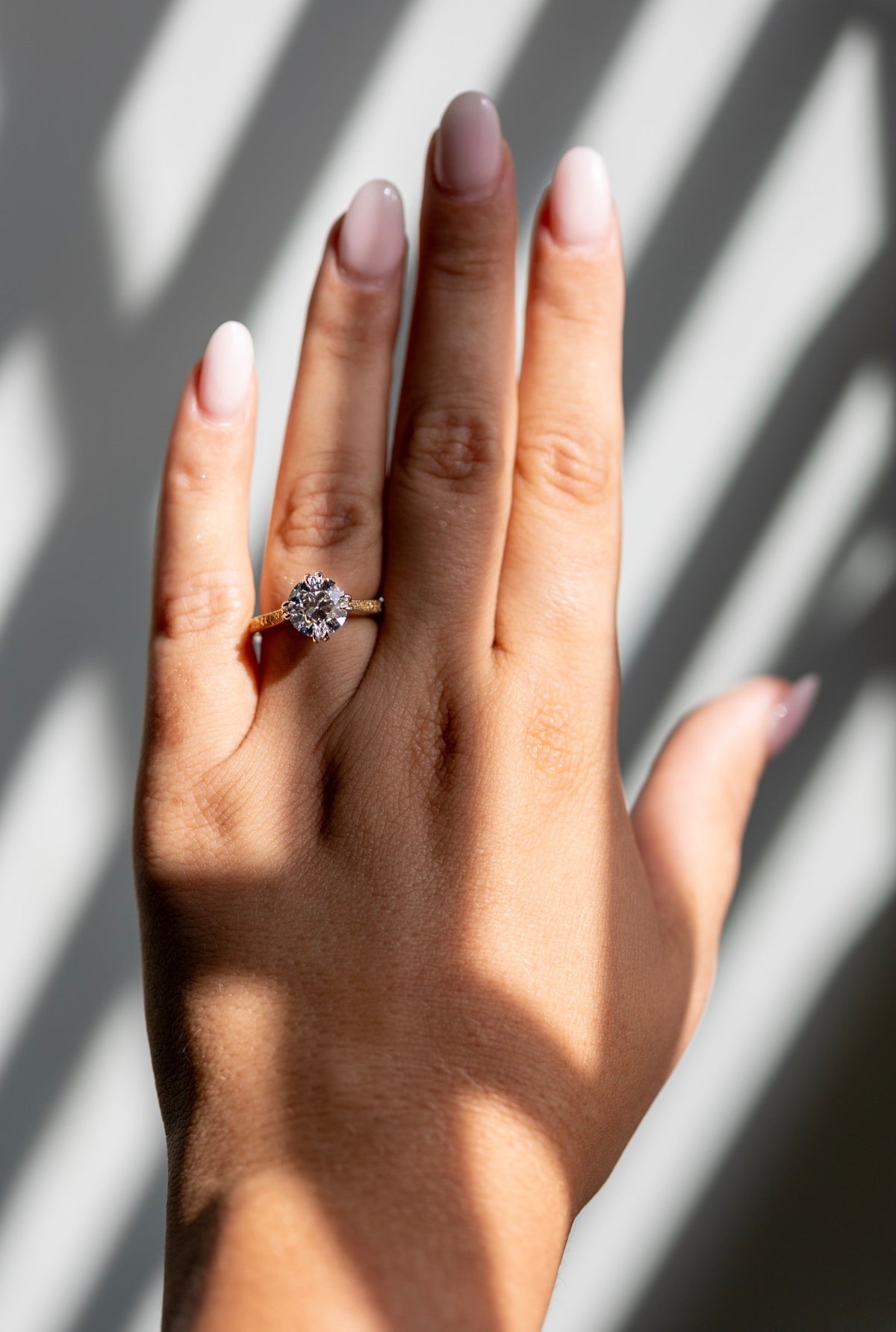 Daphne 2.56ct old European cut two tone ring worn on the hand
