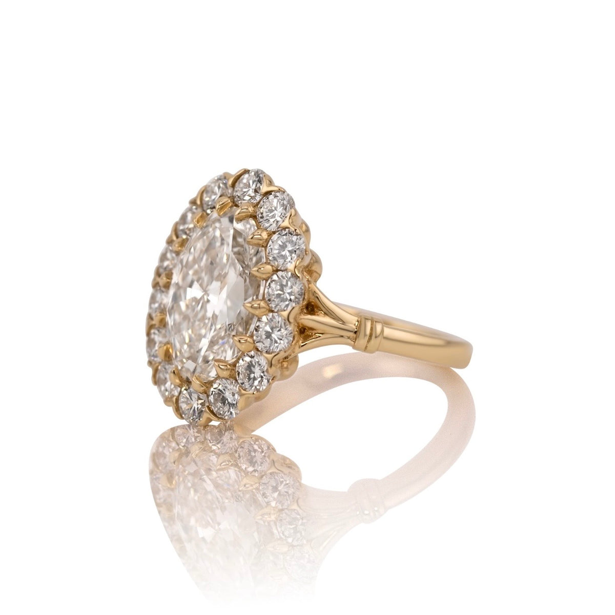 Side profile of the Callie oval halo ring showing the setting and band