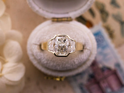 1.97ct Radiant cut three stone engagement ring