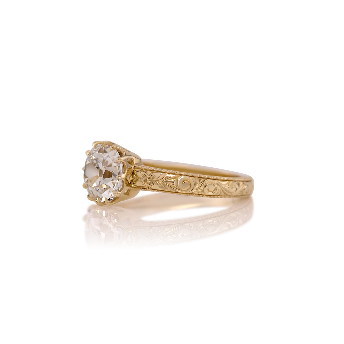 Side profile of the Madelaine ring showing the hand engraved band