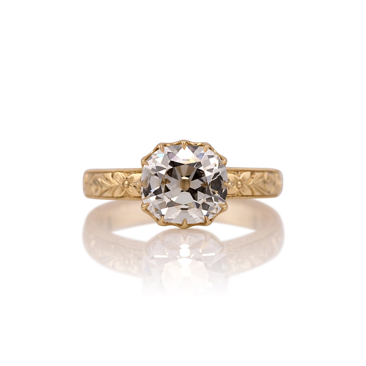2.59ct old mine cut lab diamond hand engraved ring in 14k yellow gold, shown head on against a white background