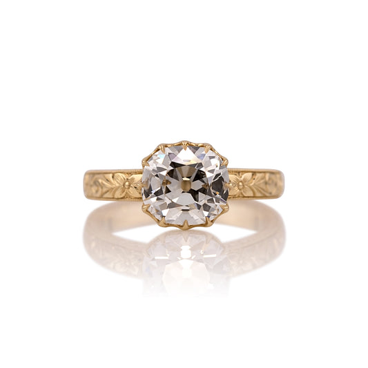 2.59ct old mine cut lab diamond hand engraved ring in 14k yellow gold, shown head on against a white background