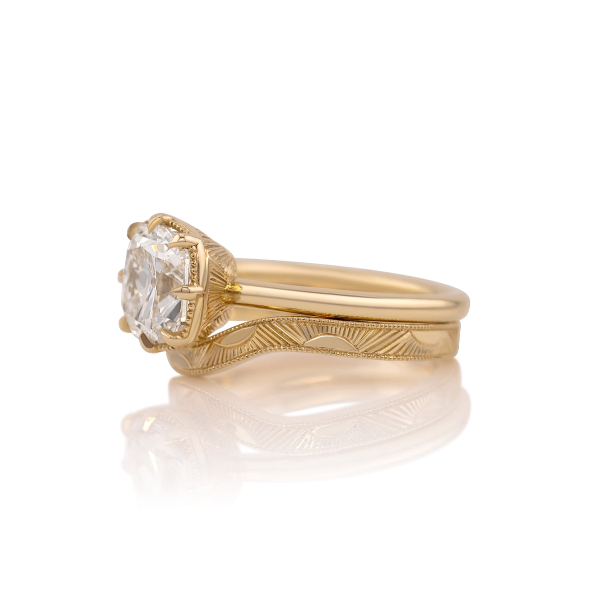 2.76ct old mine cut lab diamond bridal set in 14k yellow gold against a white background