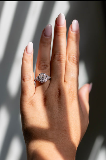 4.05ct cushion cut ring worn on the hand in 14k white gold