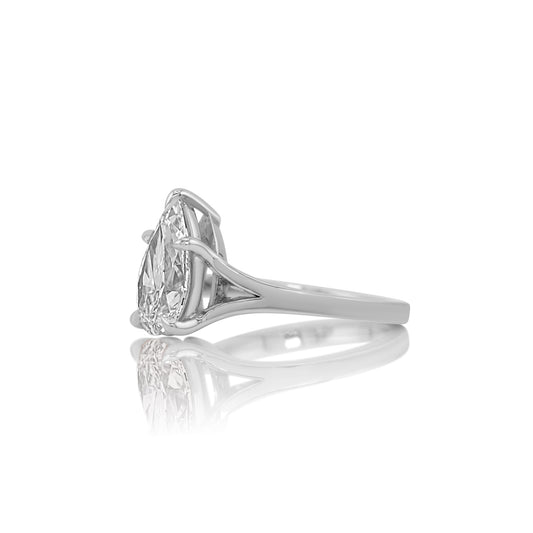 Side profile of the pear split shank ring showing how the band divides toward the center stone