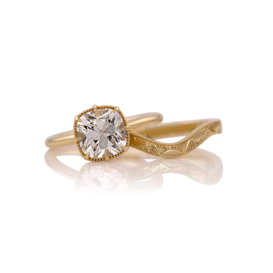 2.76ct old mine cut lab diamond bridal set in 14k yellow gold, shown head on against a white background