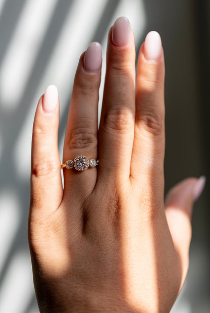 Penelope 1.08ct three stone ring worn on the hand in 14k yellow gold