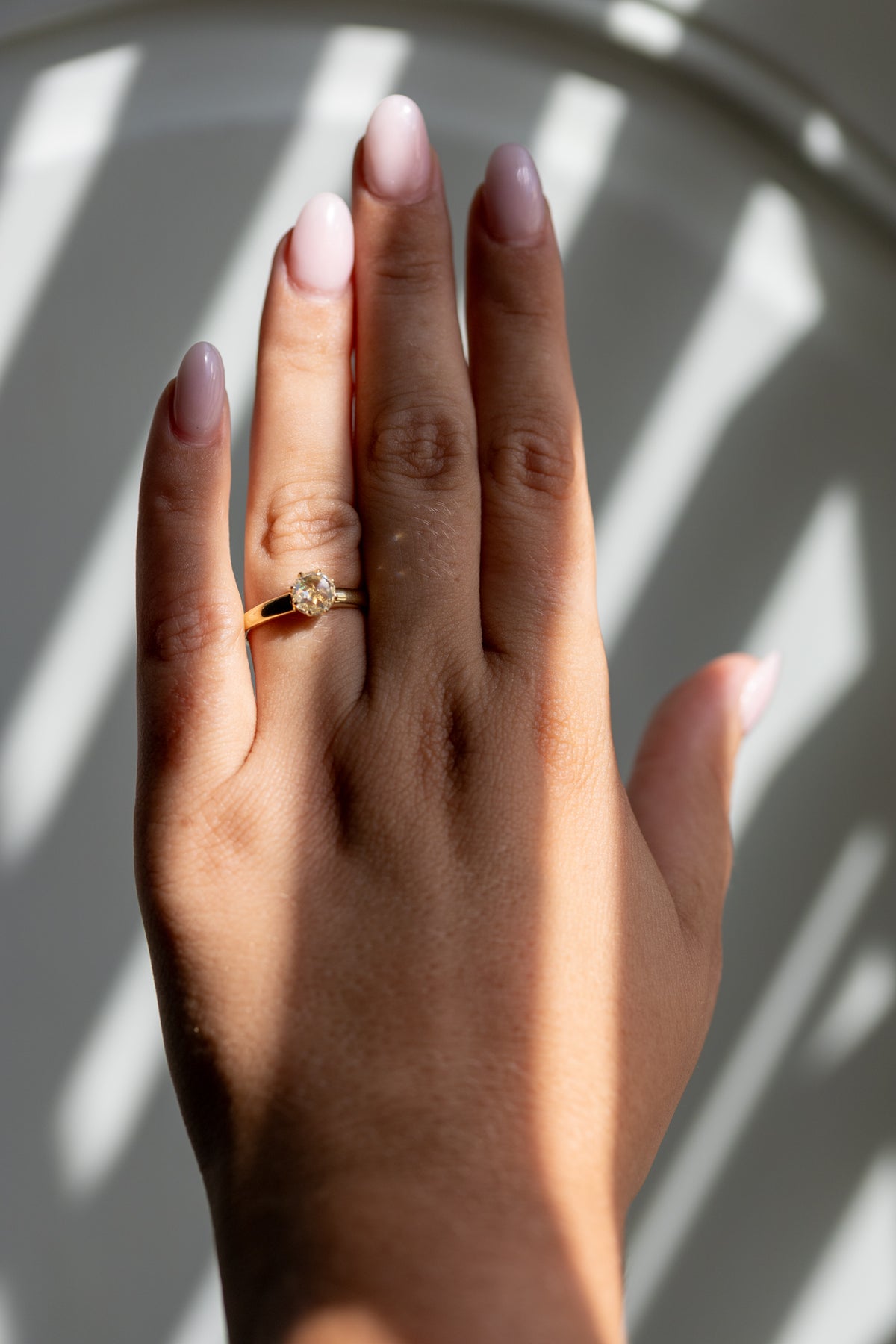 Camille 1.01ct rose cut solitaire worn on the hand in 18k yellow gold
