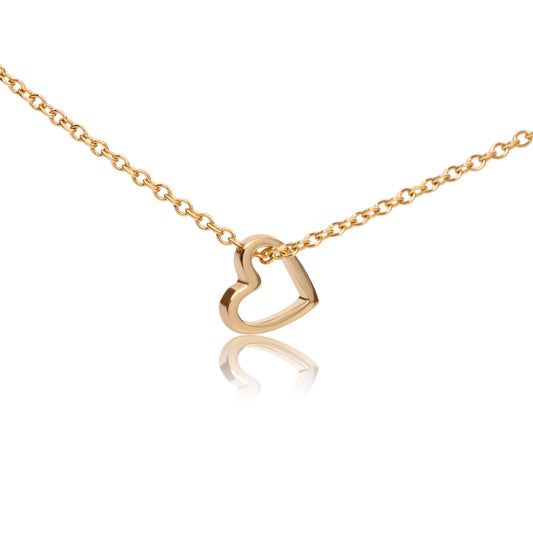 14k solid gold heart pendant, shown head on against a white background