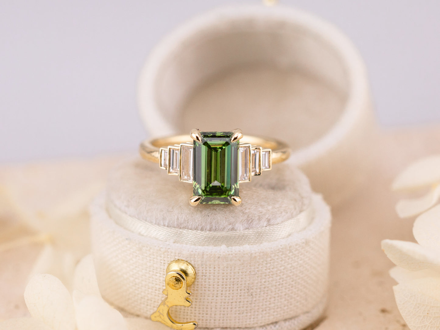 2.56ct Green emerald cut engagement ring