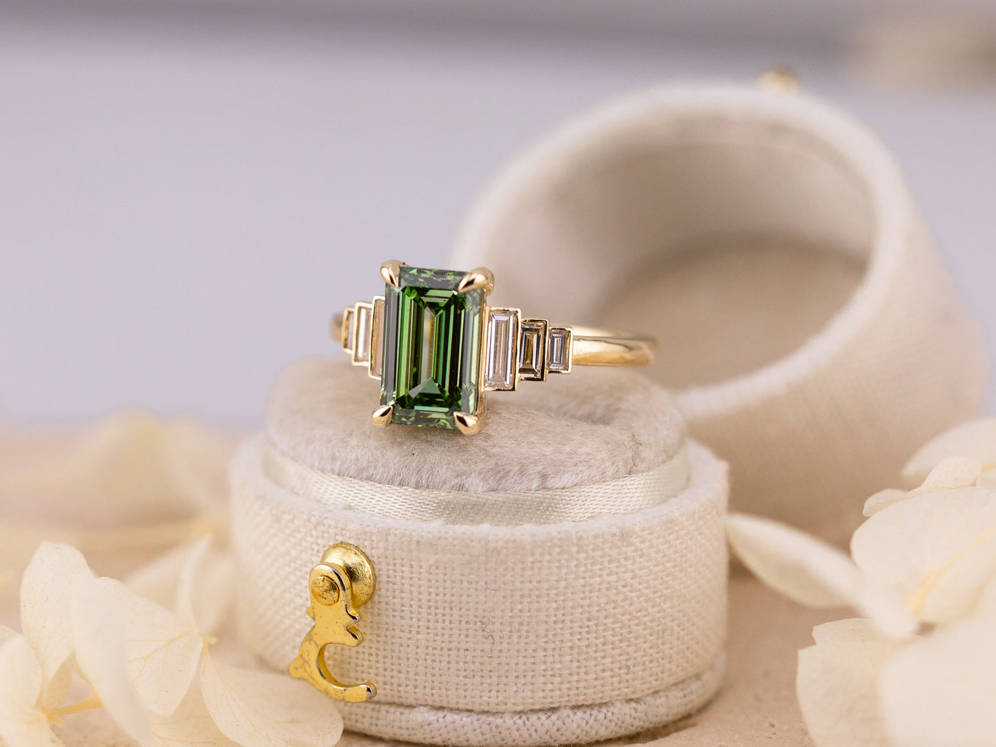 2.56ct Green emerald cut engagement ring