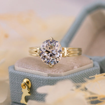 Elongated antique cut diamond with broad candlelit flashes