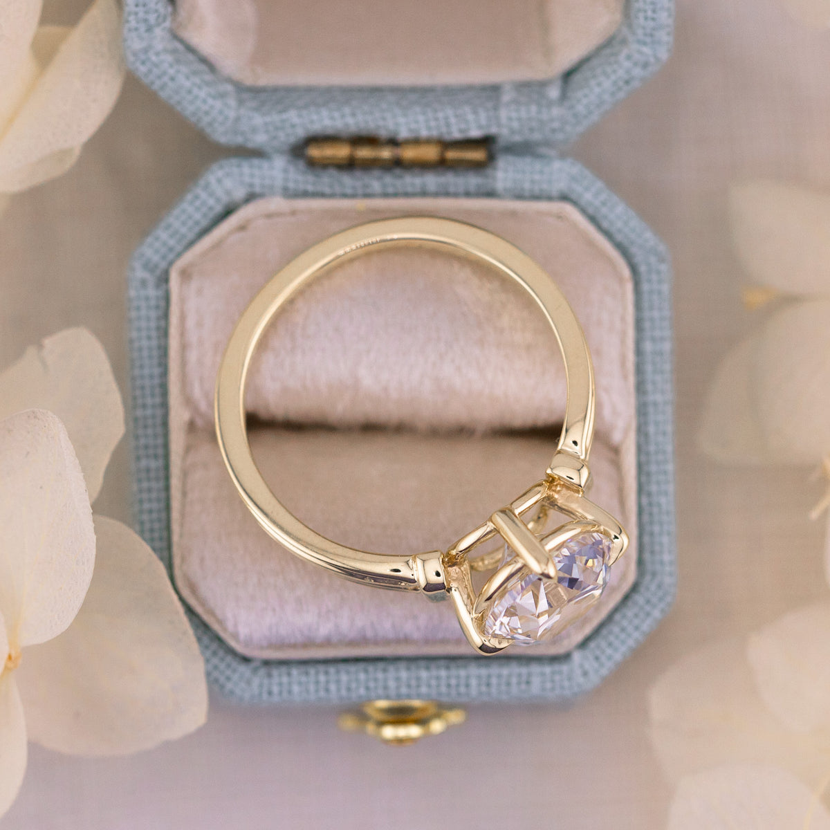 Side profile of the Harriet old mine cut solitaire in yellow gold