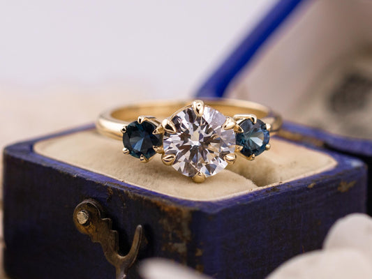 Round cut three stone engagement ring with sapphire side stones lab grown diamond 2 carat 14k solid gold IGI certified lab grown diamond