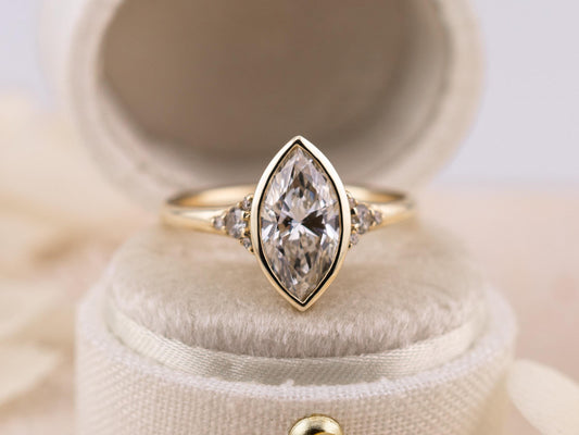 Marquise cut engagement ring lab diamond bezel set ring 14k solid gold engagement ring with side stones and tapered band IGI certified
