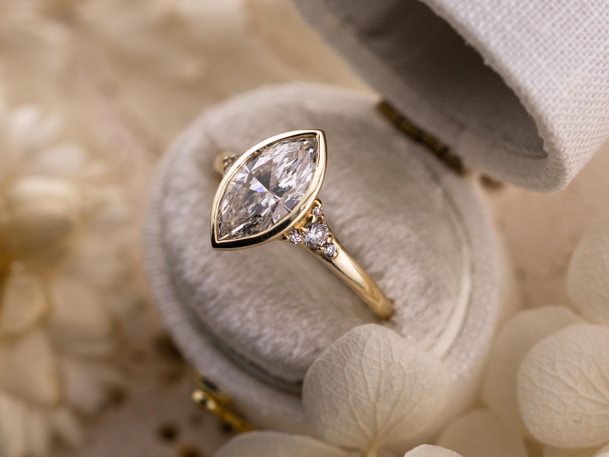 Marquise cut engagement ring lab diamond bezel set ring 14k solid gold engagement ring with side stones and tapered band IGI certified