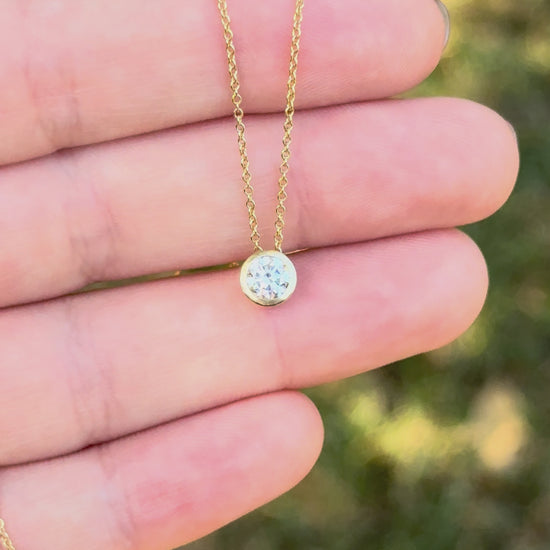 Video of the slider bezel lab diamond pendant in 14k gold